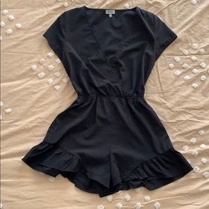 Tobi Romper! Black, v-neck with ruffle bottom